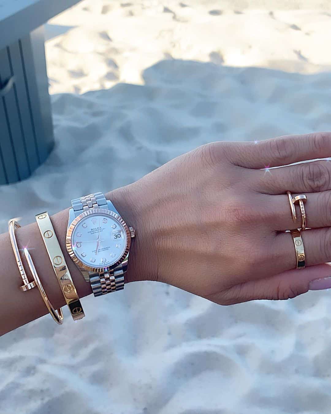 Rolex and Cartier Jewelry Stacked