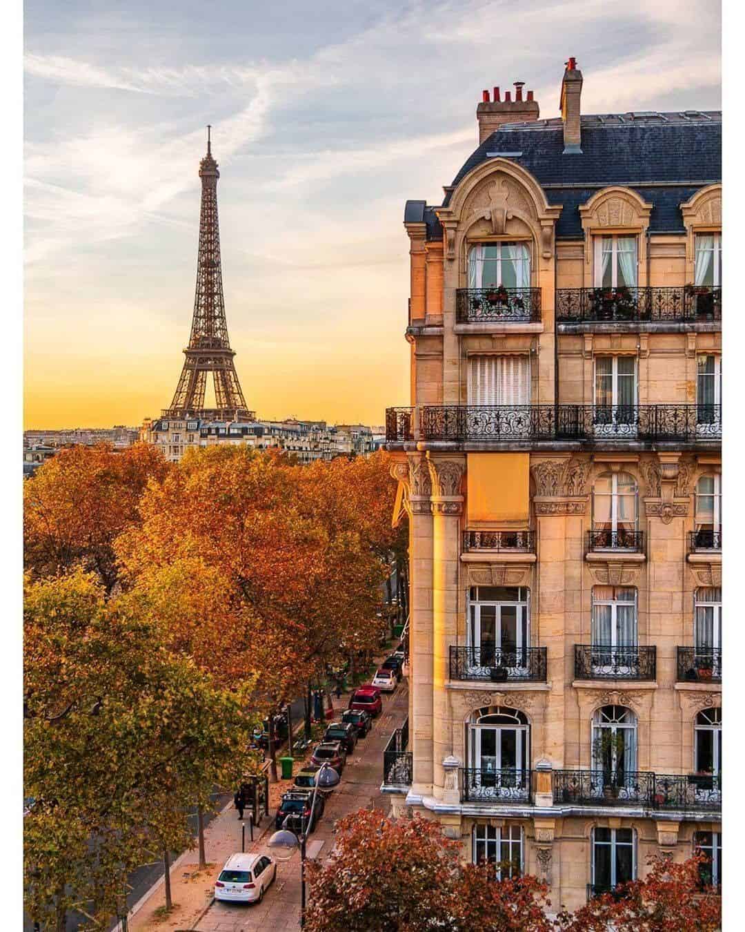 Eiffel Tower and Haussmann building in Paris petiteinparis