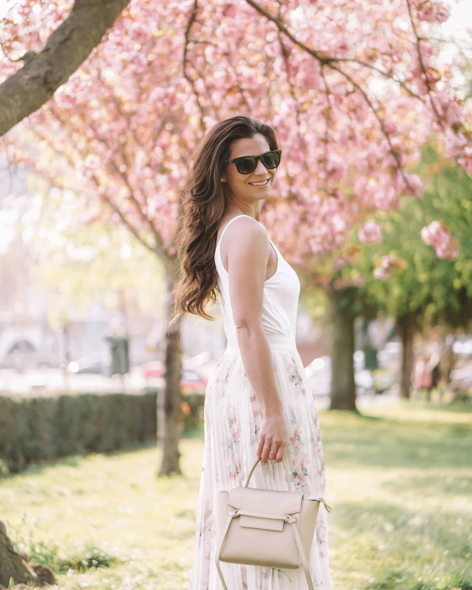 paris blogger wearing a champagne gold celine bag