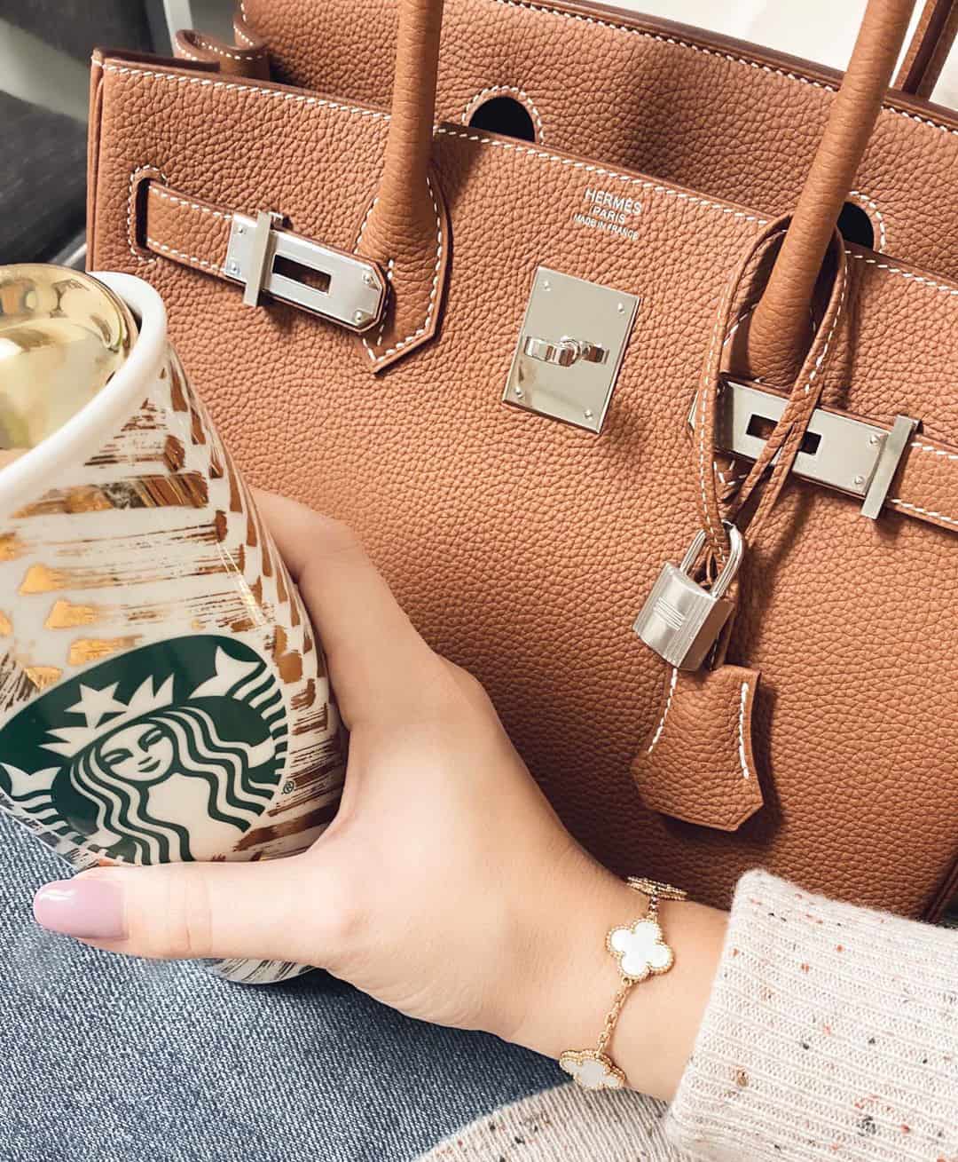 van cleef bracelet and birkin bag gold togo leather