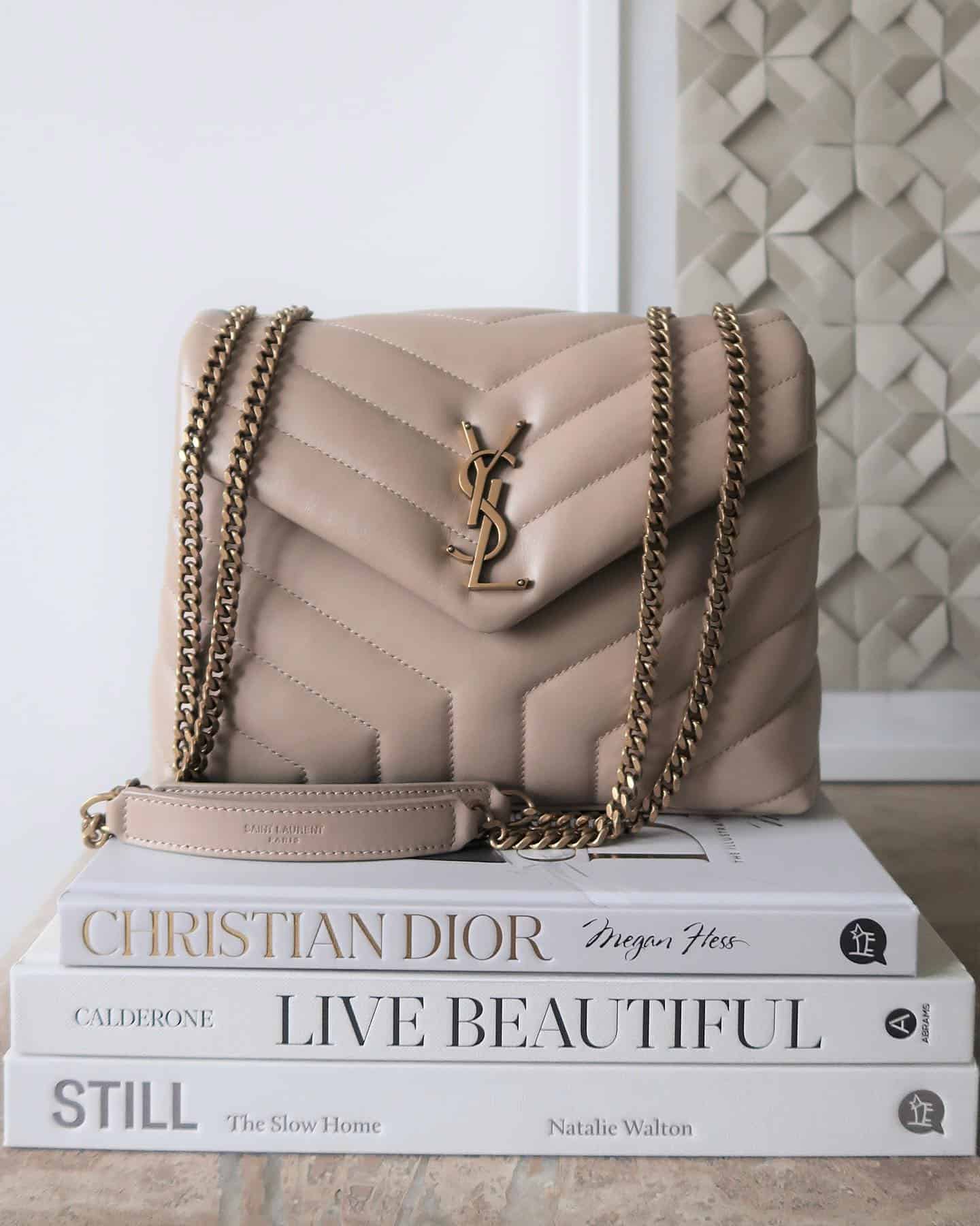 Small Loulou Bag stacked on books decor