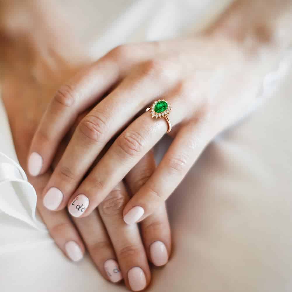 Emerald engagement ring diamond alternative