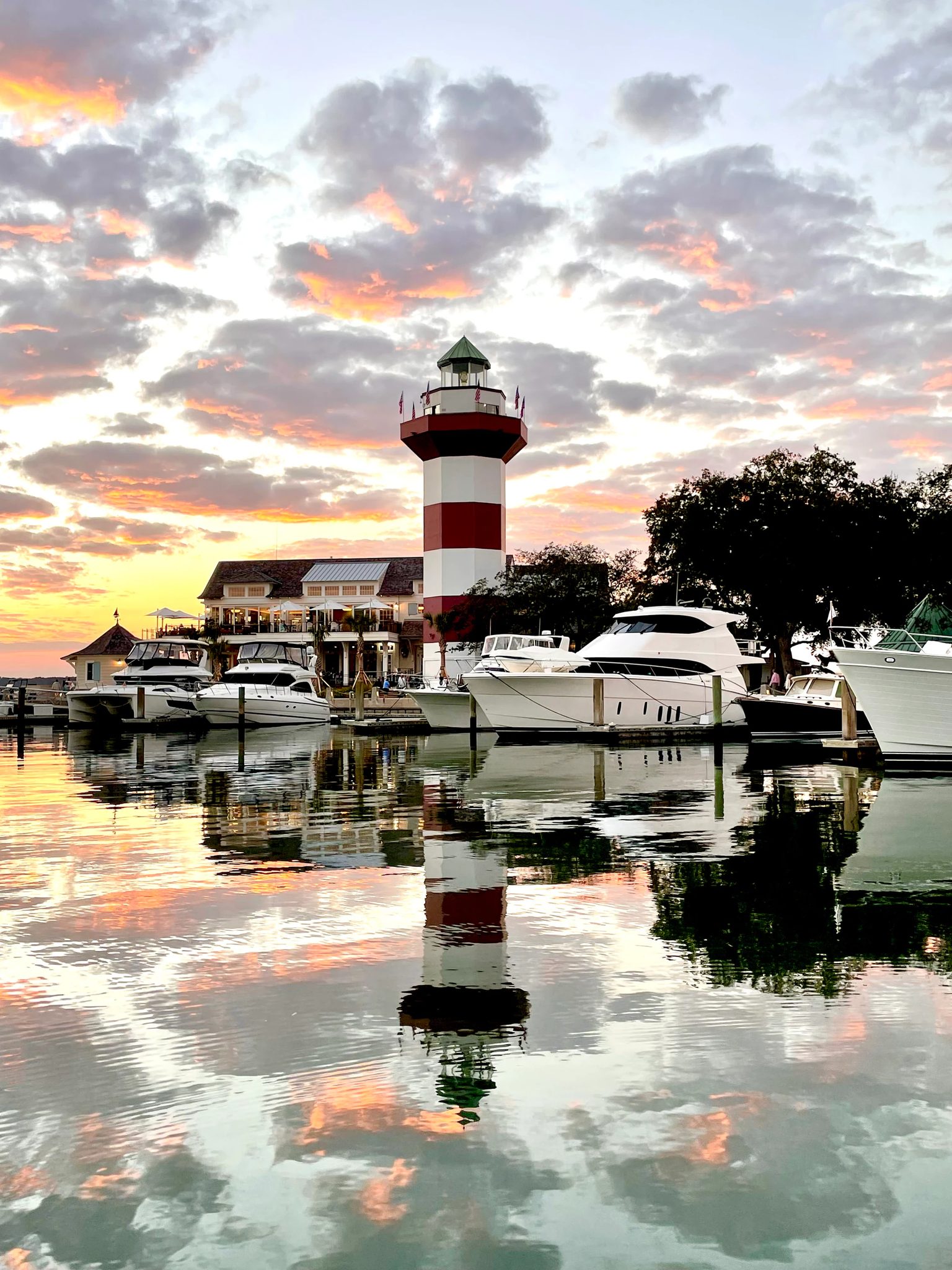 Harbour Town lighthouse and boats at sunset on Hilton Head Island